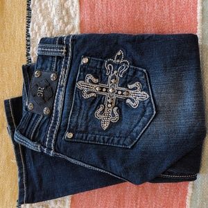 Women's Miss Me Jeans. Boot cut. Size 27. Inseam: 34.